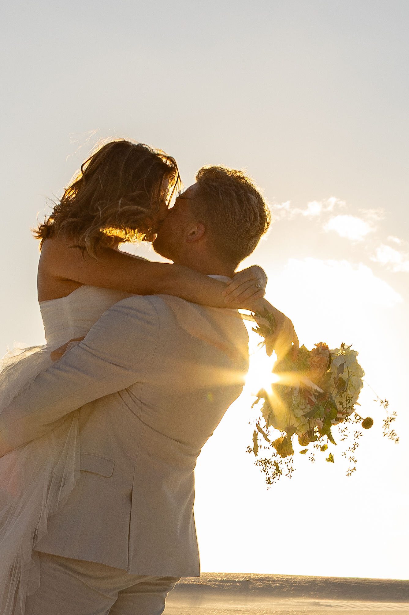 Couple eloping at sunset in Florida